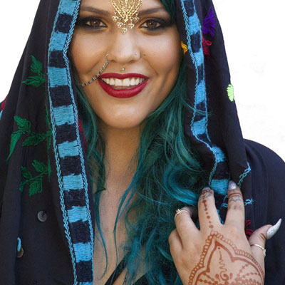 Traditional dress, jewelry, and henna tattoos