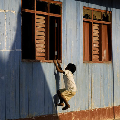 Kid climbing through window